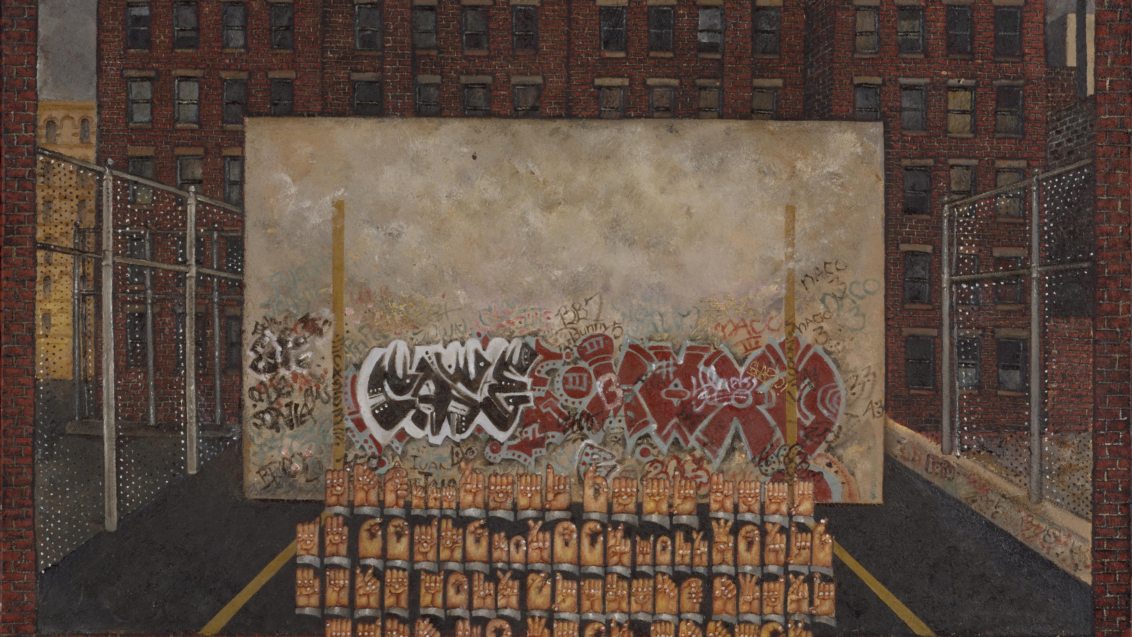 A graffitied concrete wall in a blacktop court, surrounded by chain-link fencing. Rows of hands expressing different signs fill the court in front of the wall.