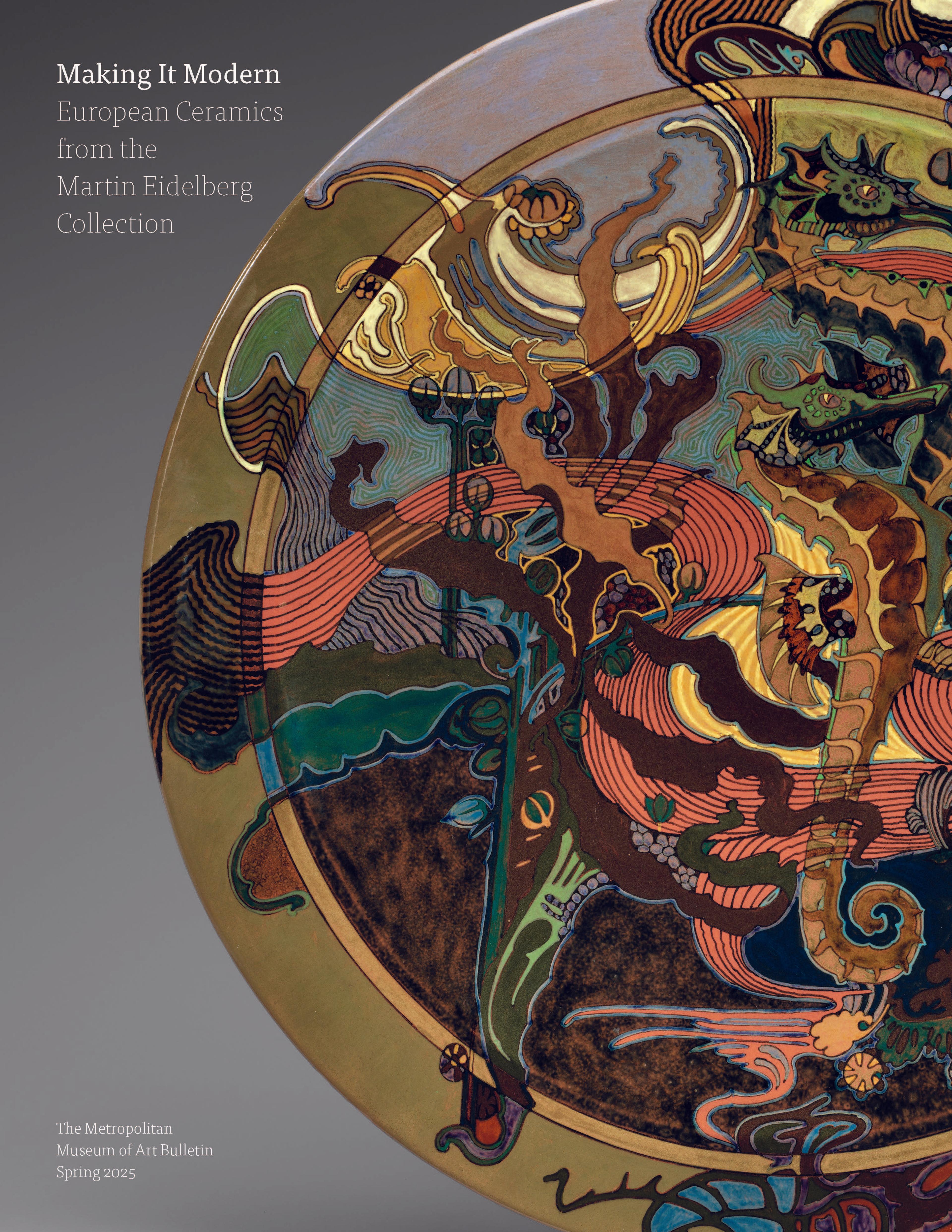 multicolored ceramic plate against a grey background