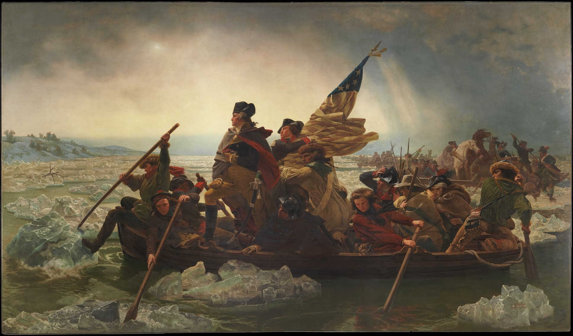 A painting depicting General George Washington leading his troops across the Delaware River during the American Revolutionary War. Washington is at the bow of a wooden boat, wrapped in a dark blue cloak, with the American flag held high. The soldiers, bundled in winter coats, row the boat through icy waters under a dim, cloudy sky.